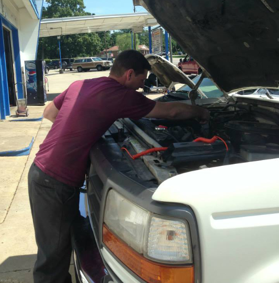 mechanic working on engine